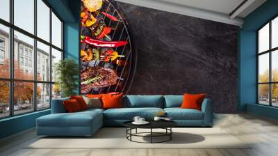 barbecue garden grill with beef steaks, close-up. Wall mural