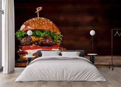 Close-up of home made tasty burger on wooden table. Wall mural