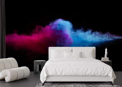 Colored powder explosion on black background. Wall mural