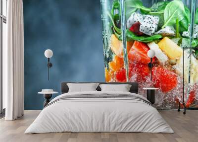 Fresh fruit and vegetables smoothie blended in blender, back view. Healthy eating concept. Wall mural