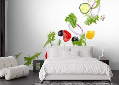 Fresh salad with flying vegetables ingredients isolated on a whi Wall mural