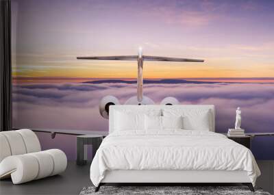 Small private jetplane flying above beautiful clouds. Travel and transportation concept. Wall mural