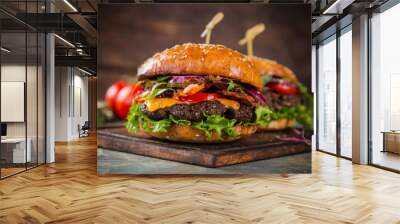 Tasty burgers on wooden table. Wall mural