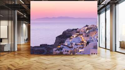 The famous sunset at Santorini in Oia village Wall mural