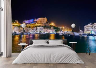 Night view of the port and Citadel of Bonifacio in Corsica island Wall mural