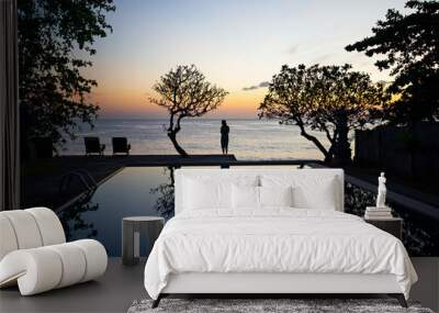 Sunrise by the pool at Bali - Indonesia. Wall mural