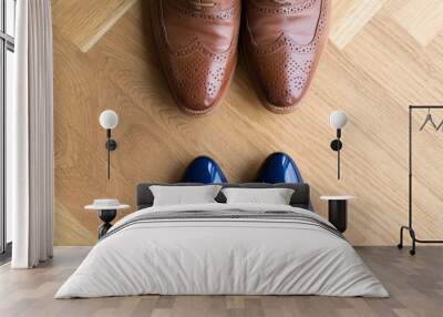 stylish leather shoes of a man and of a woman on wooden floor Wall mural