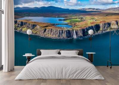 Aerial view of the dramatic coastline at the cliffs by Staffin with the famous Kilt Rock waterfall - Isle of Skye - Scotland Wall mural