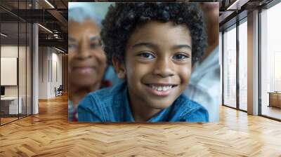 Joyful family portrait showcasing love and smiles as they bond and relax together during a holiday at home. Happiness shared among a mother, grandmother, and young child Wall mural