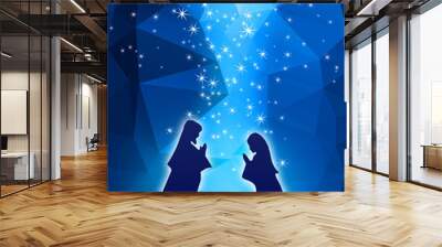 Chritmas Nativity Scene - Holy Family on blue low-poly starry background Wall mural