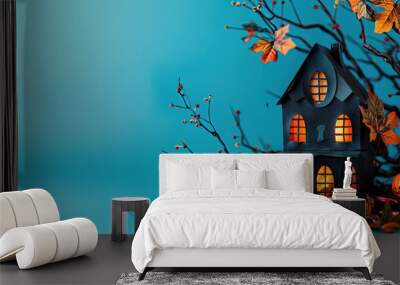 Hallowen miniature house with light blue background in spooky style, blank space for text. Wall mural