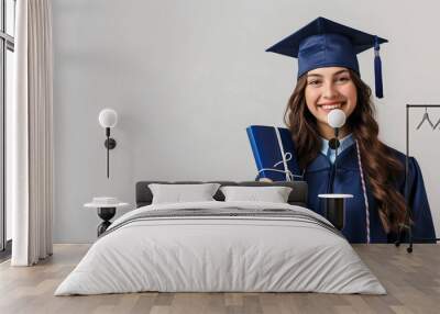 female graduate holding her diploma at graduation ceremony Wall mural