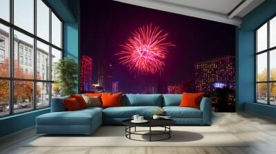 Beautiful firework display for celebration happy new year and merry christmas with  Twilight night and firework lighting in bangkok cityscape background, Thailand. Wall mural