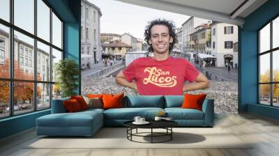 young man on a bridge in Milan Wall mural