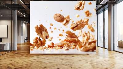 walnuts splash scattered in the air, white background Wall mural