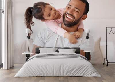 Family hug, happy love and father with smile for child on sofa in home, care for kid and excited about weekend together in the living room. Girl hugging dad while relax on couch in the lounge Wall mural