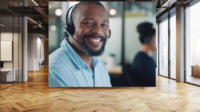 Call center, customer support and face of black man at desk working on computer, online and telemarketing. Crm, contact us and portrait of consultant for friendly service, help and customer service Wall mural