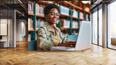 Happy short-haired African girl student using laptop computer technology sitting in university campus library. Smiling young Black woman elearning looking away advertising hybrid work, Generative AI Wall mural