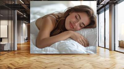 Woman sleeping in bed. Young woman sleeping peacefully in bed Wall mural