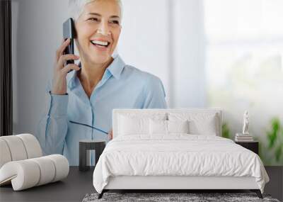 business woman senior portrait office executive casual beauty smartphone mature grey Wall mural