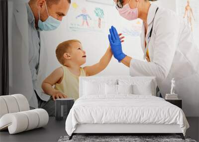 child doctor hospital patient medical nurse medicine health woman boy mask corona virus epidemic care healthcare pediatrician stethoscope clinic toy man Wall mural