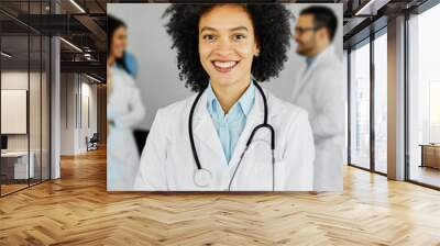 doctor nurse portrait man hospital group team medical uniform health black african american smiling professional clinic medicine male happy female occupation teamwork care Wall mural