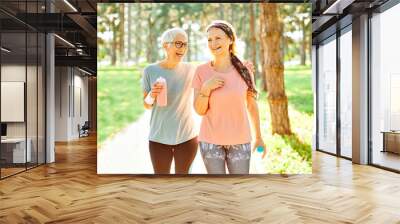 outdoor senior fitness woman lifestyle active sport exercise healthy fit runner running jogging elderly mature gray hair Wall mural