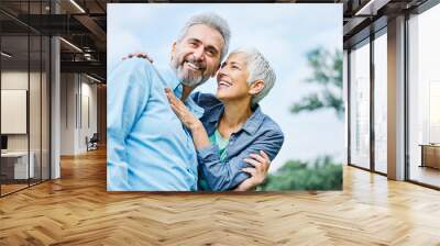 senior couple happy elderly love together retirement lifestyle smiling man woman mature Wall mural