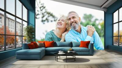 woman man couple happy together hug bonding mature mid middle age aged park outdoor talking leisure fun smiling love old nature wife happiness lifestyle people adult caucasian husband togetherness Wall mural