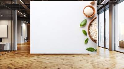 Risotto in a Wooden Bowl with Ingredients on White Background Wall mural