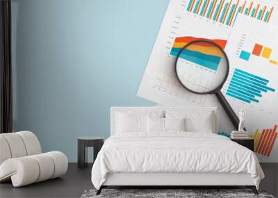 business graphs, charts and magnifying glass on table. financial development, banking account, stati Wall mural