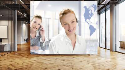 modern office, two beautiful businesswoman Wall mural