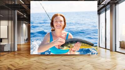 Woman fishing Dorado Mahi-mahi fish happy catch Wall mural