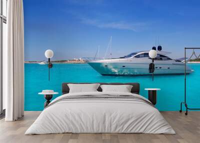 yatch in turquoise beach of formentera Wall mural