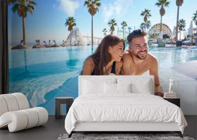 Young couple on infinity pool cocktails Wall mural