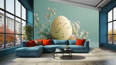 A pastel yellow Easter egg adorned with delicate flowers and greenery sits against a soft green background, embodying a joyful spring celebration filled with vibrant colors Wall mural