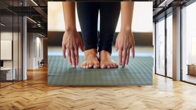 Hands, feet and woman stretching on yoga mat for exercise, cardio and flexibility warm up in her home. Barefoot, hand and girl stretch for meditation, training for pilates workout in a living room Wall mural