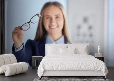 Portrait, woman and glasses with clear vision, happiness and health with care, blur and joy in office. Face, female customer and lady with eyewear, sight and see with spectacles and prescription lens Wall mural