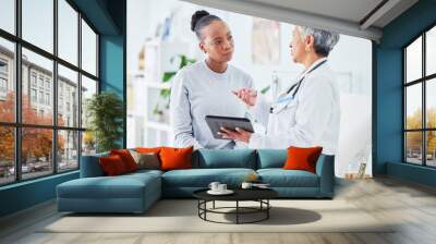 Doctor, woman and tablet for hospital, healthcare advice and support for results, exam and test on bed. Senior expert or medical people on digital tech for clinic sign up, registration and consulting Wall mural