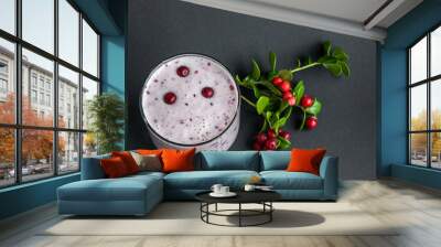 Berry smoothie. Milkshake with fresh lingonberries on a dark background. Healthy food, detox or diet concept. Copy space Wall mural