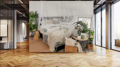 Bright white bedroom filled with numerous houseplants and flooded in natural light Wall mural