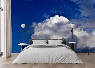 The stormy beauty of the blue Cumulus clouds in summer Wall mural