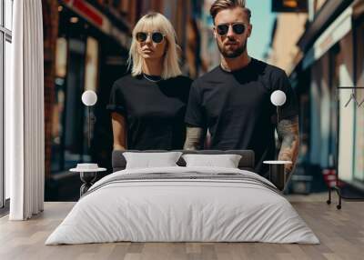 Man and woman wearing blank black t-shirt Wall mural