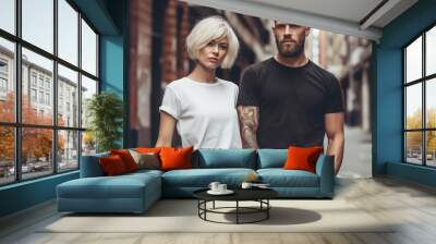 Man and woman wearing blank white and black t-shirt Wall mural