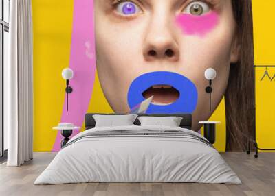 Banner. poster. Contemporary art collage. Modern artwork. Porait of emotional, surprised woman with drawings on face agains vivid yellow background Wall mural