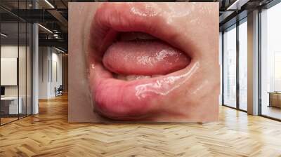 Closeup of beautiful sensual woman's lips covered with honey, transparent gel. Beauty, fashion, style concept. Emotions and feelings Wall mural