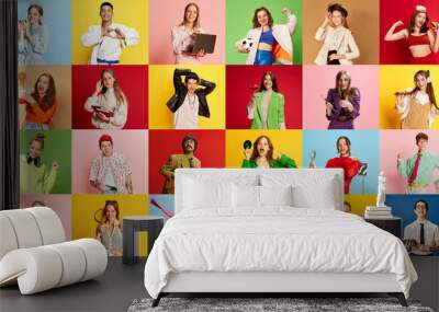 Collage made of portraits of different young people, men and women posing in various clothes over multicolored background Wall mural