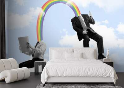 Contemporary art collage of two working employee with rainbow head isolated over blue backgroud with clouds Wall mural