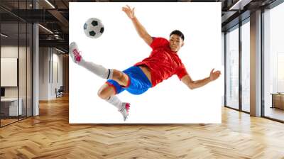 Man, football player in colorful uniform during game, in motion with ball isolated on transparent background Wall mural