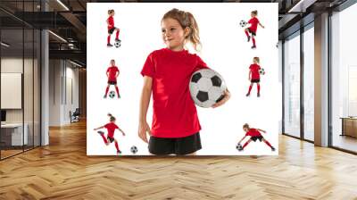 Portraits of little girl, child, training, playing football isolated over white studio background. Collage Wall mural